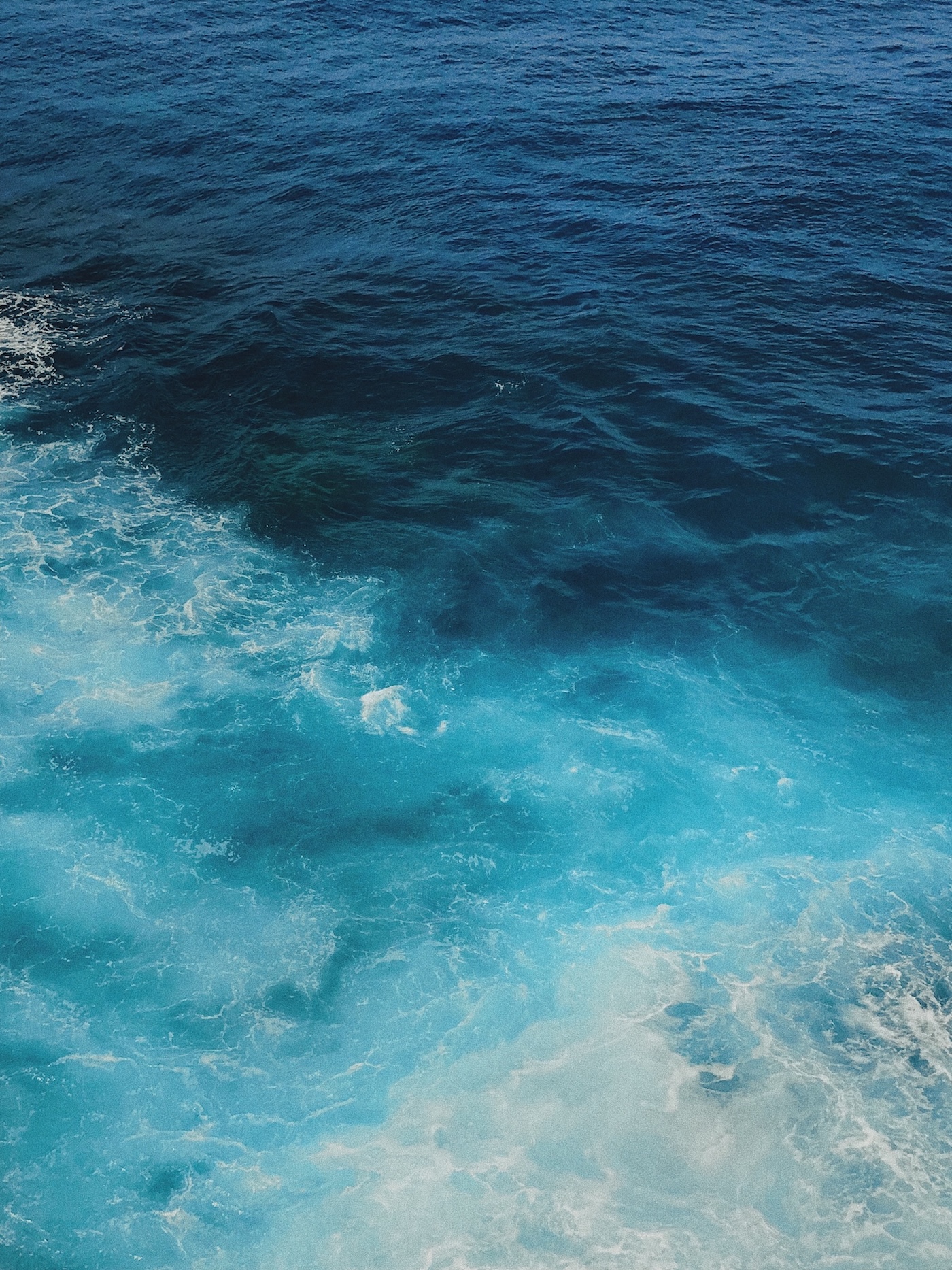 Top view of waving shiny seawater